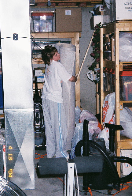 Sheila helping to organize storage room