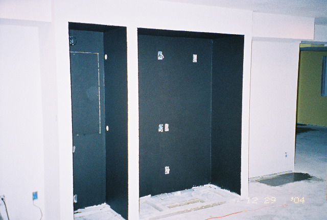 Painted electronics bays in media room