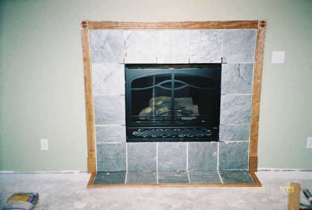 Decorative fireplace surround built