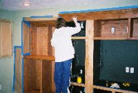 Sheila staining media room cabinets